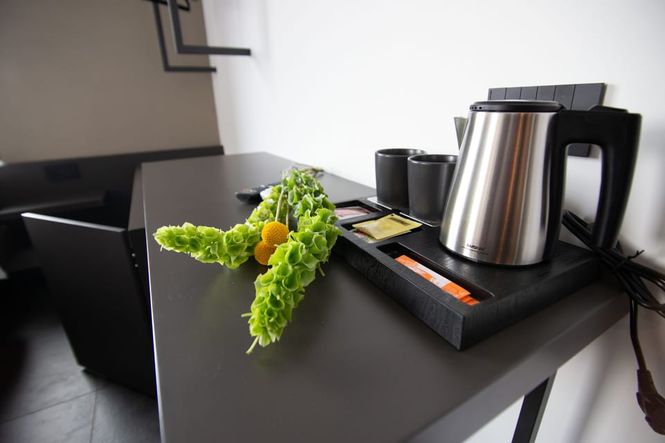 Luxury Triple Room, Multiple Beds, City View (1) | Coffee and/or coffee maker