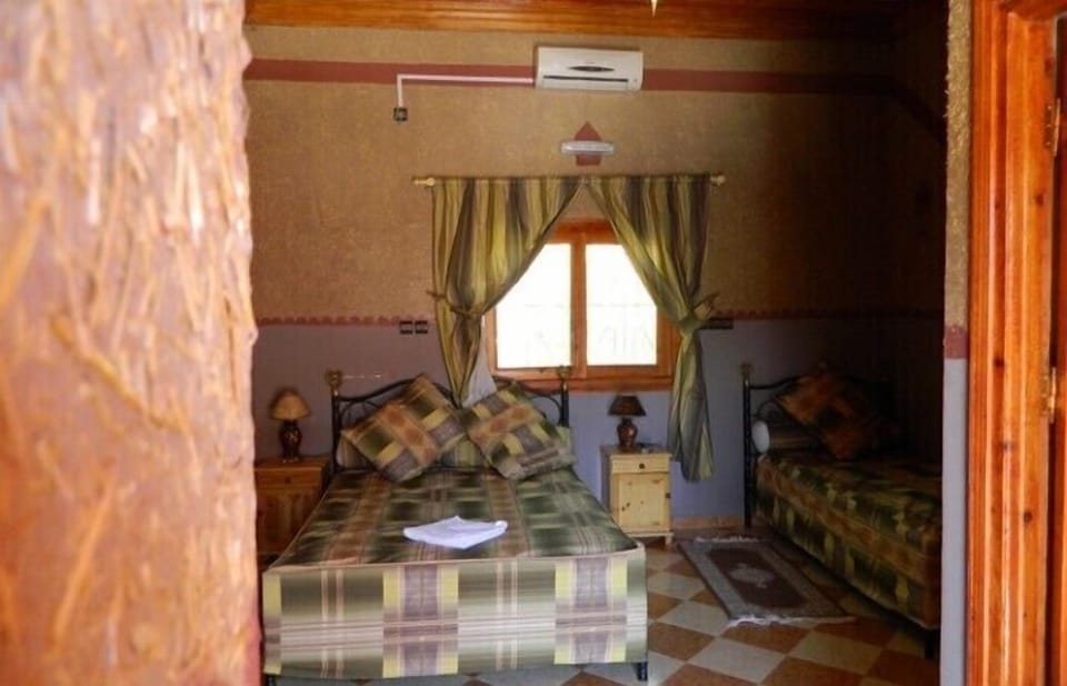 Blackout drapes, WiFi (free), bed sheets