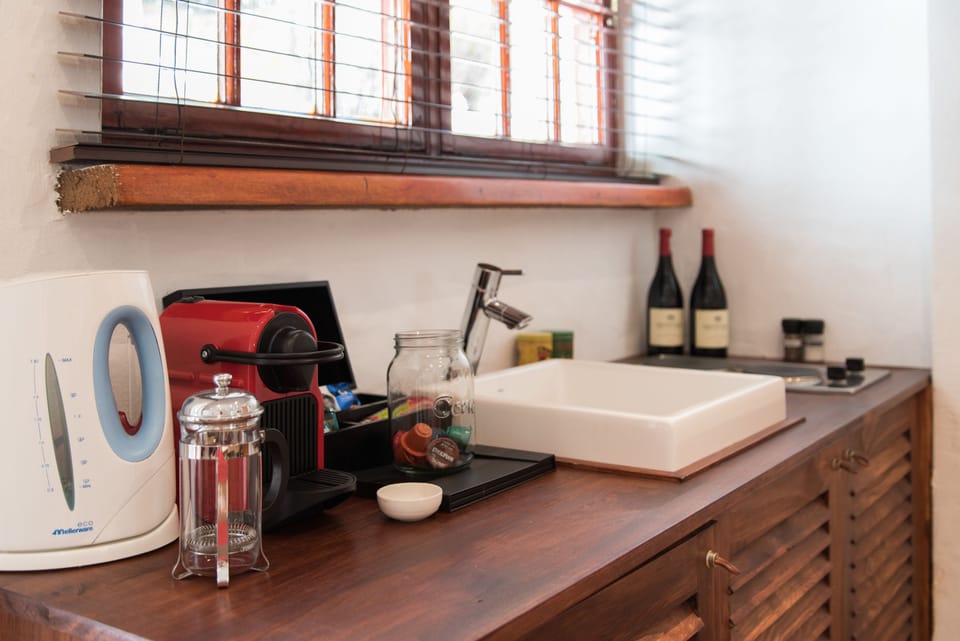 Junior Suite, 1 Bedroom | Private kitchenette | Full-size fridge, stovetop, espresso maker, coffee/tea maker