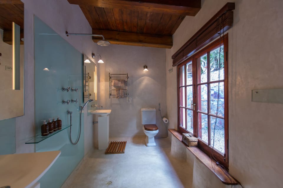 Suite, 1 Bedroom | Bathroom | Shower, designer toiletries, hair dryer, bathrobes