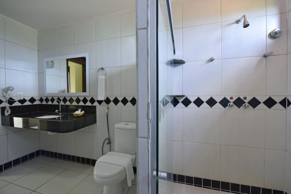 Shower, rainfall showerhead, hair dryer, towels
