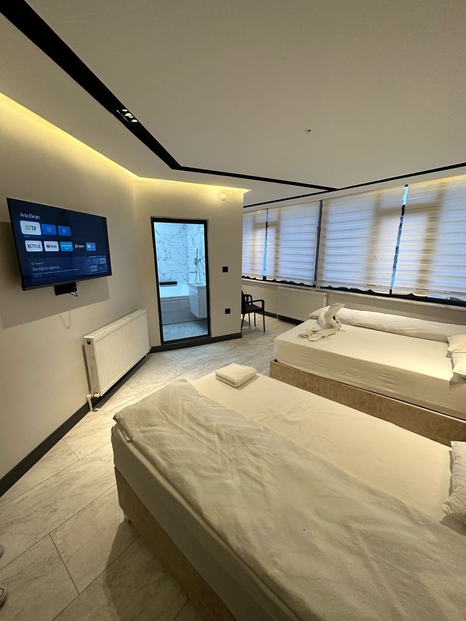 Family Room, 2 Bedrooms, City View | Desk, laptop workspace, soundproofing, free WiFi