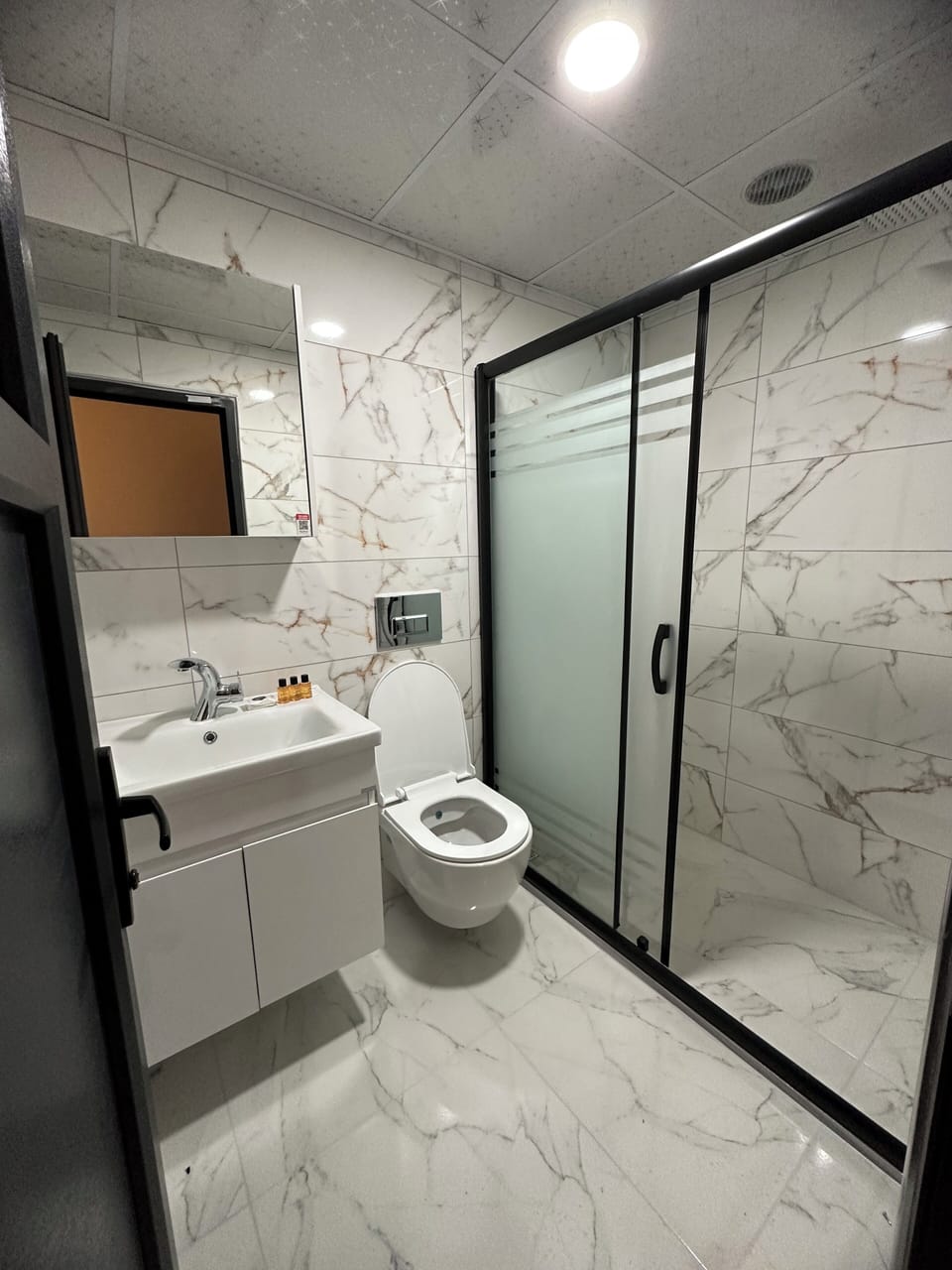 Triple Room | Bathroom | Shower, slippers, towels