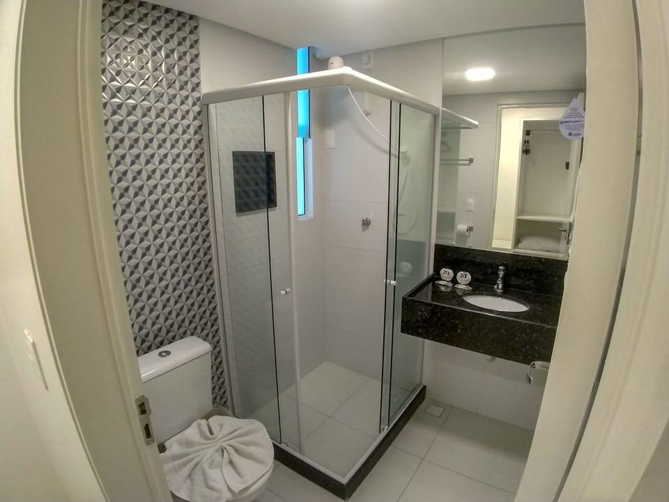 Shower, free toiletries, hair dryer, towels