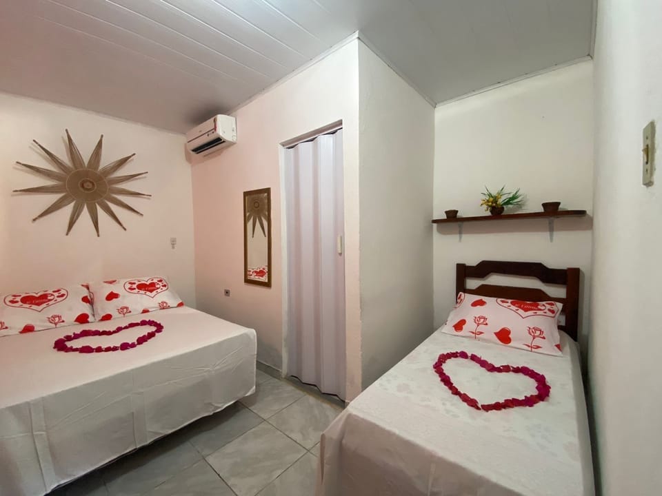 Triple Room | Minibar, blackout drapes, free WiFi, bed sheets