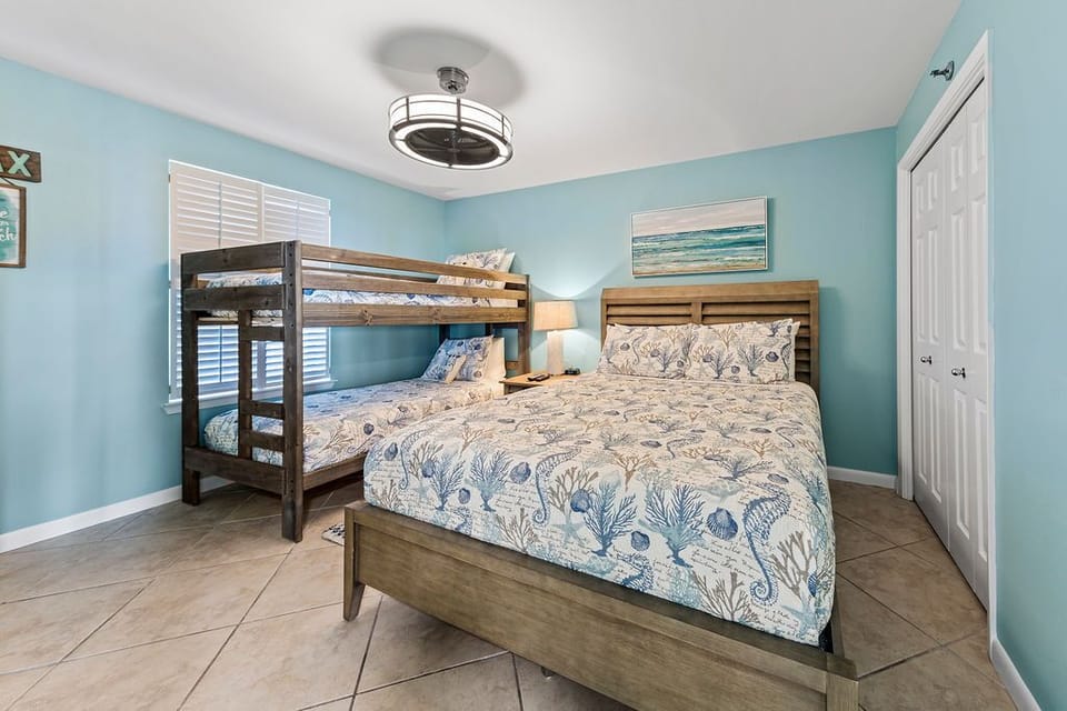 Bedroom 3 with queen size bed and twin bunk bed.