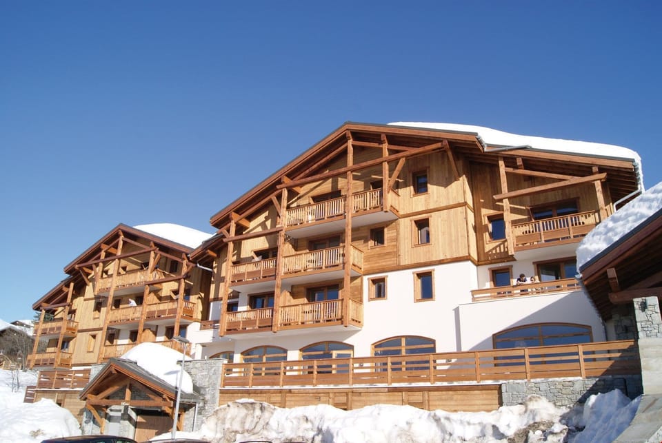 Hop on the free shuttle in the morning to get to the ski lifts, or to the charming village centre.