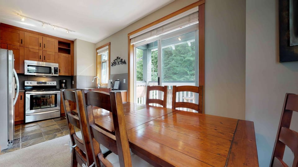 - Modern kitchen overlooks the dining area