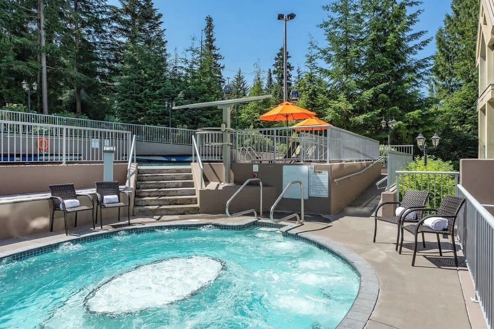 - Bubbling hot tub with forest views and cozy seating nearby  
- Relax your muscles after a day of skiing or exploring trails  
- Ultimate alpine retreat for calm, comfort, and pure relaxation