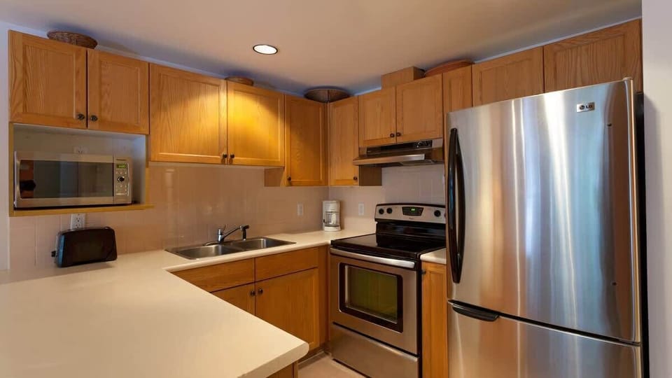 - Sleek kitchen with stainless steel appliances and bright lighting  
- Spacious counters and modern design for easy meal prep  
- Everything you need for comfortable long or short stays  