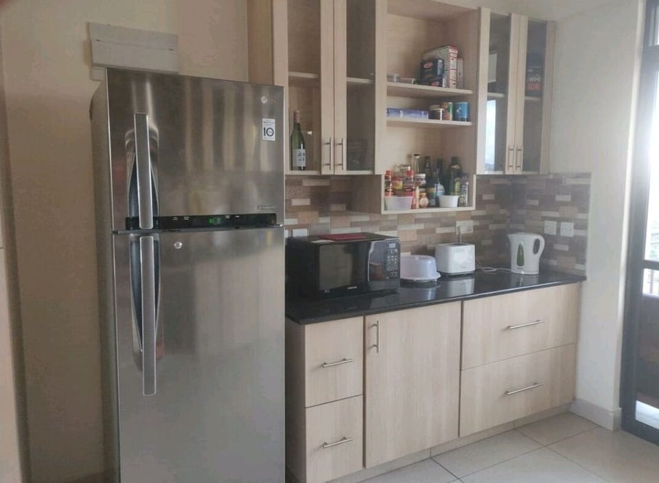 Kitchen area with access to second balcony