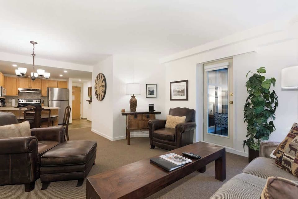 - Bright and spacious living area blending rustic comfort and modern touches  
- Plush seating, natural wood furniture, and mountain-inspired décor  
- Ideal for gatherings, quiet evenings, and cozy indoor moments  
