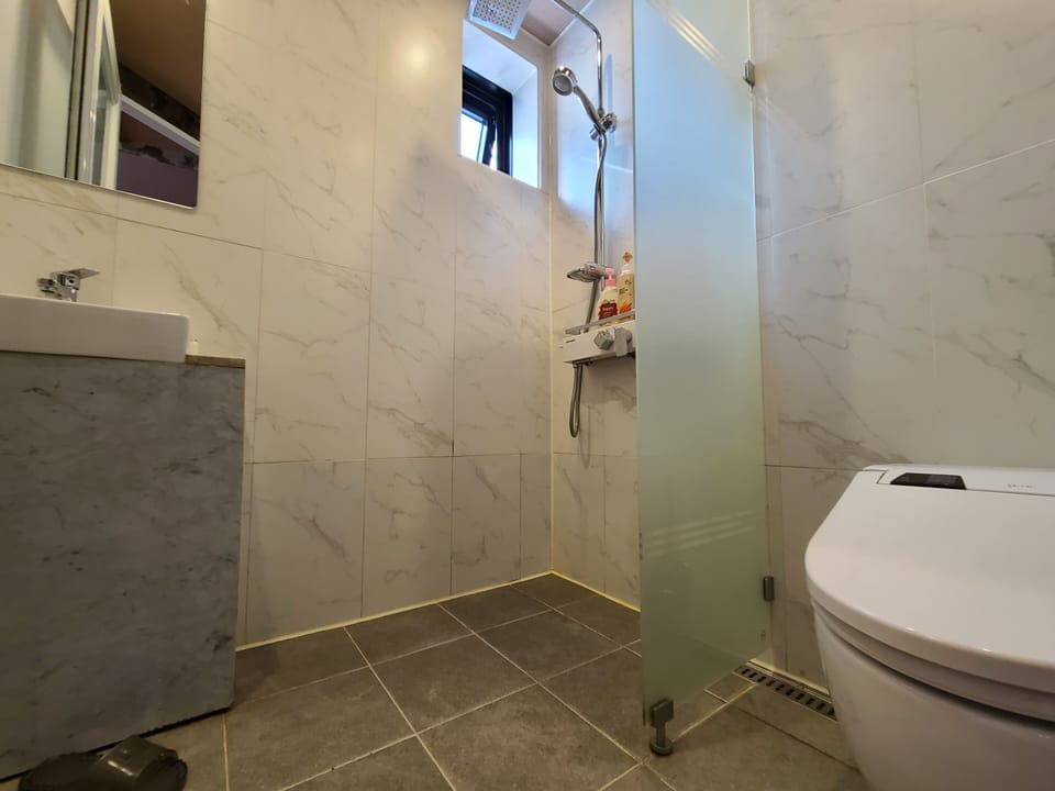 Shower, free toiletries, hair dryer, bathrobes