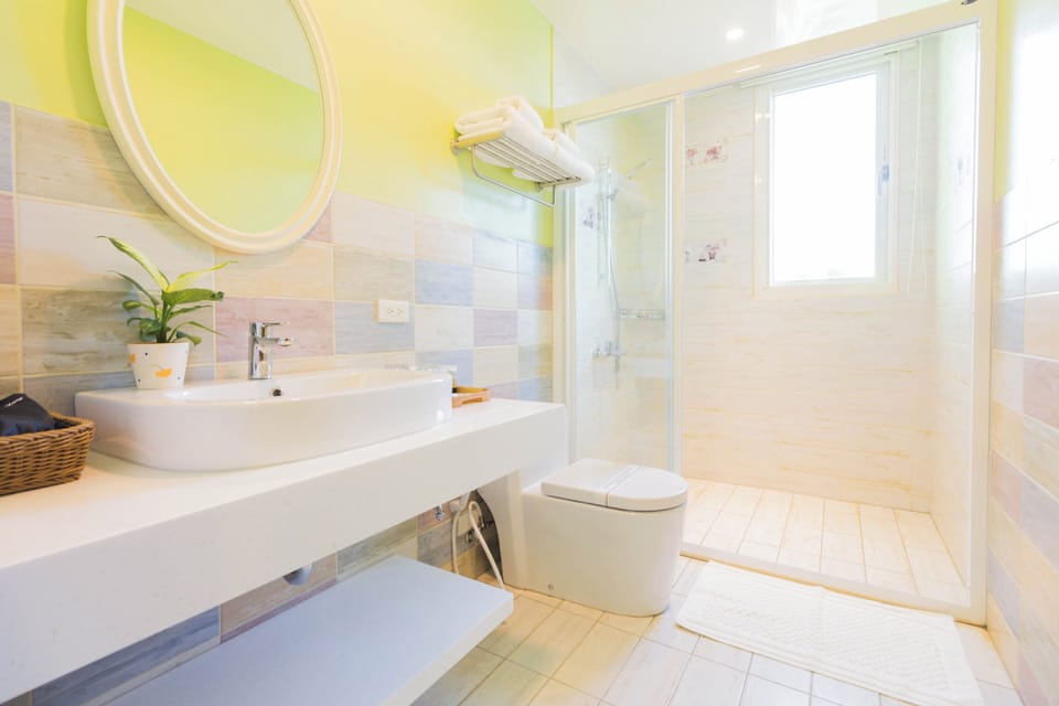 Shower, free toiletries, hair dryer, slippers