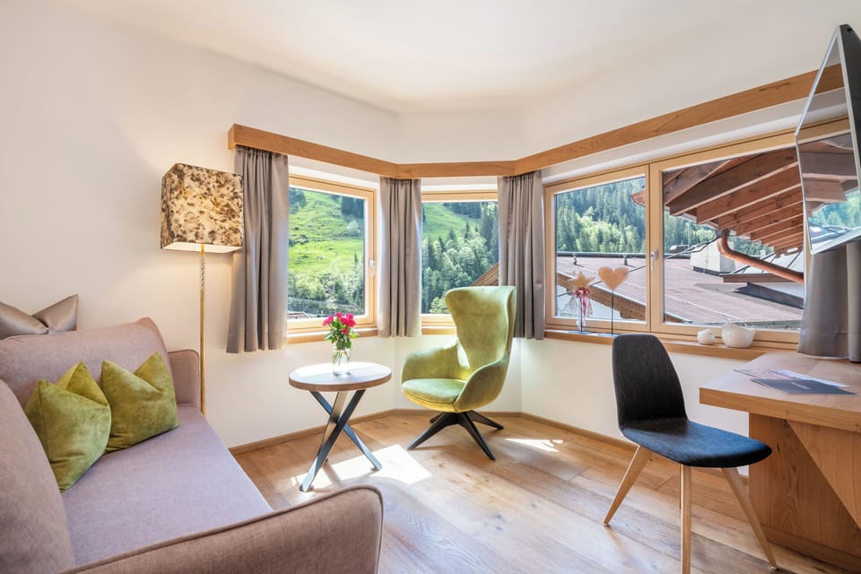 Deluxe Family Room, Balcony, Mountain View | Premium bedding, in-room safe, individually decorated
