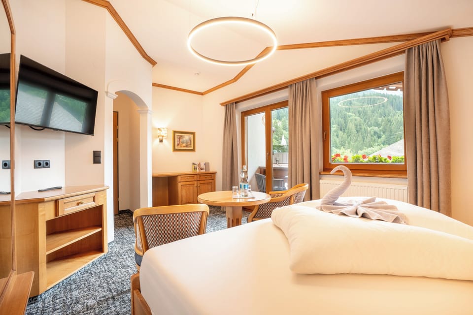 Deluxe Family Room, Balcony, Mountain View | Premium bedding, in-room safe, individually decorated