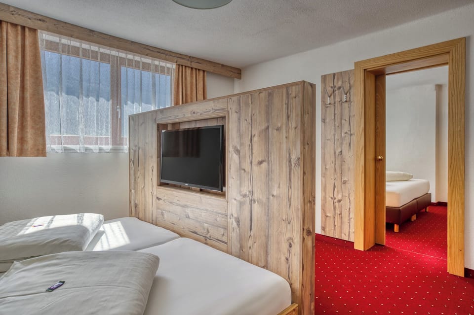 Family Room, 2 Bedrooms | In-room safe, desk, WiFi (free), individually decorated