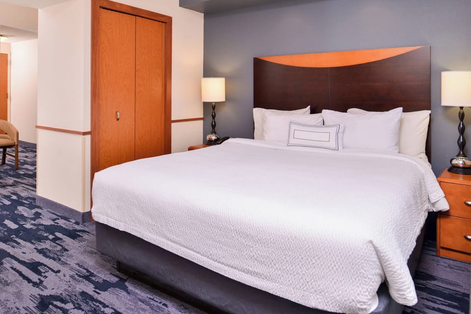 Premium bedding, pillowtop beds, desk, laptop workspace