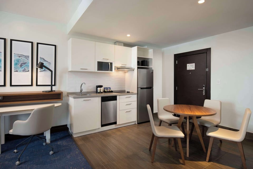 Suite, 1 Bedroom, Non Smoking | Private kitchen | Full-size fridge, microwave, dishwasher, coffee/tea maker