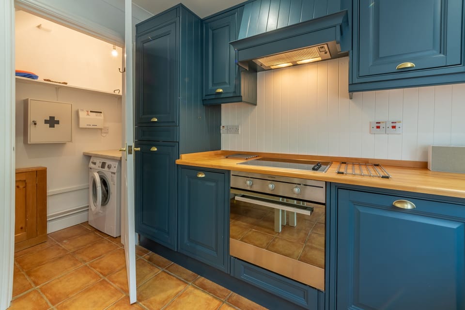 Ground floor: Kitchen leading to the utility