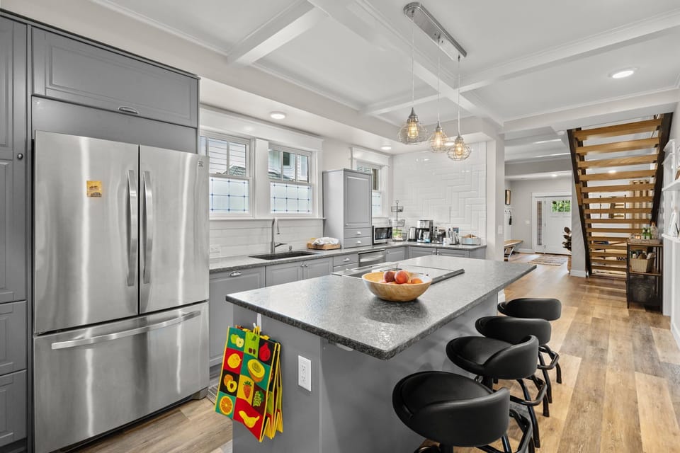 Kitchen— features extra-large French door fridge with filtered ice maker