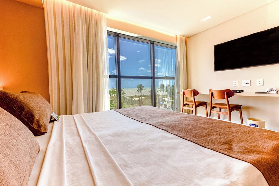 Deluxe Quadruple Room | Minibar, desk, free WiFi, bed sheets