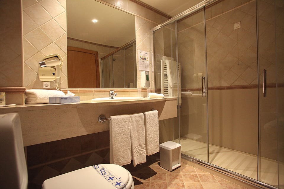 Shower, free toiletries, hair dryer, bathrobes