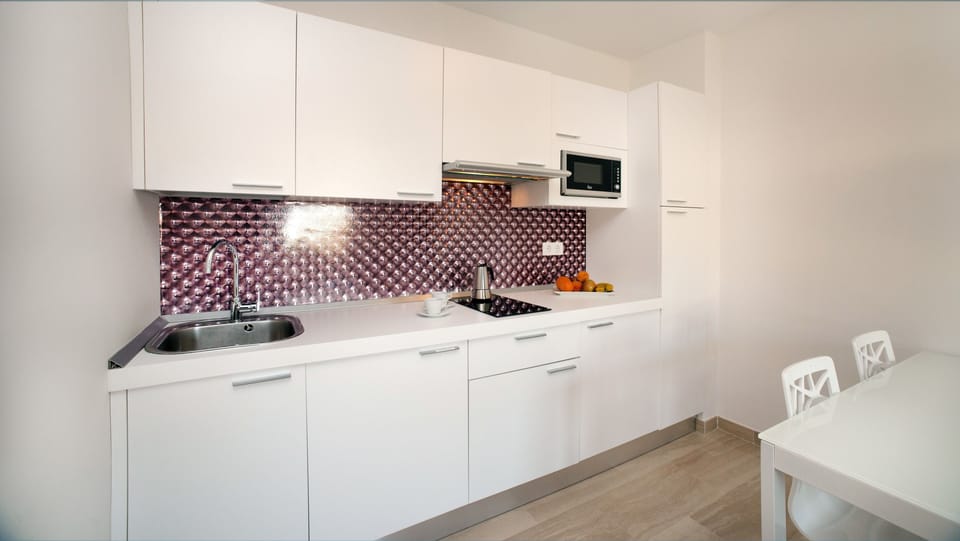 Superior Apartment, 1 Bedroom (2 adults + 2 children) | Private kitchen | Espresso maker, full-size fridge, microwave, stovetop