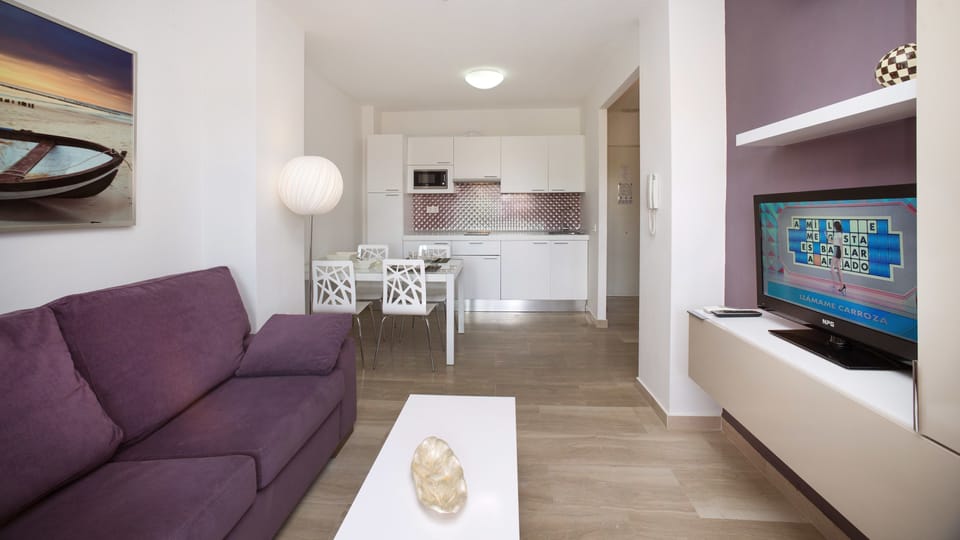 Superior Apartment, 1 Bedroom (2 adults + 2 children) | Living area | 26-inch flat-screen TV with digital channels, LCD TV