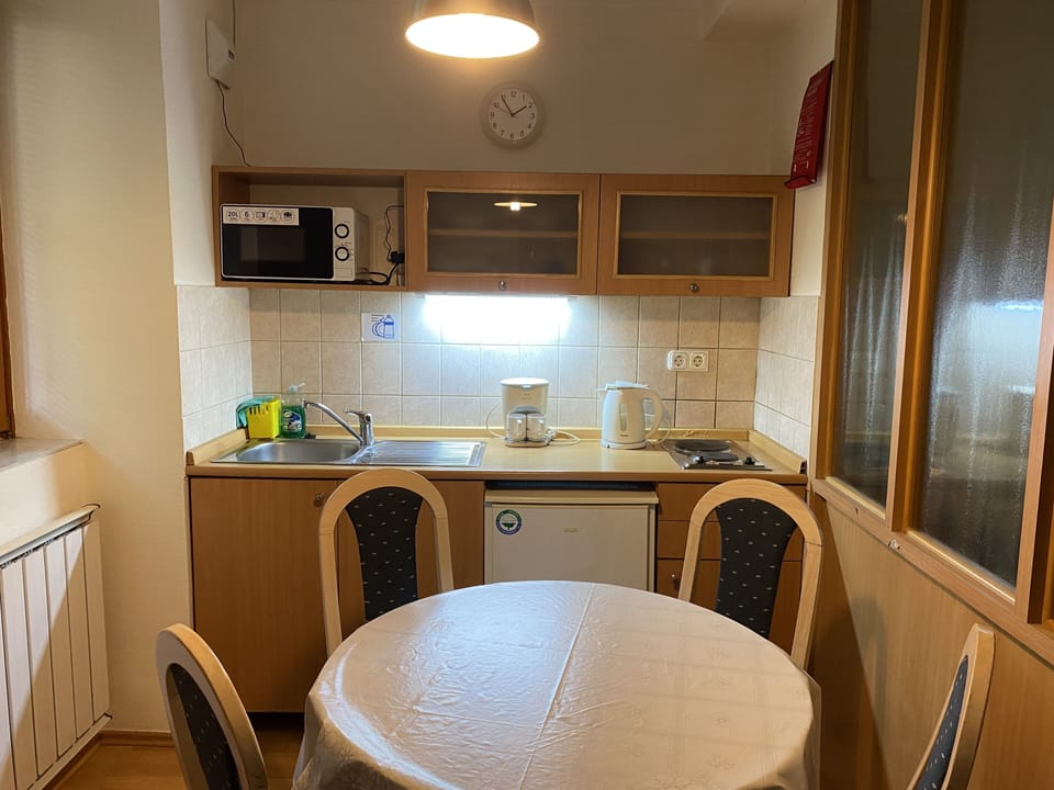 Comfort Apartment, 2 Bedrooms, Balcony, Garden View | Private kitchen | Full-size fridge, microwave, stovetop, coffee/tea maker