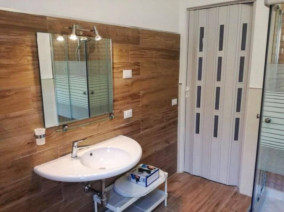 Deluxe Quadruple Room, Multiple Beds, Sea View | Bathroom sink