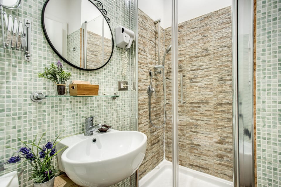 Standard Double or Twin Room | Bathroom | Shower, hair dryer, slippers, bidet