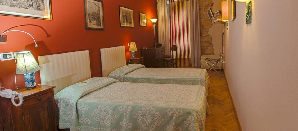 Classic Room, City View | Minibar, blackout drapes, soundproofing, iron/ironing board