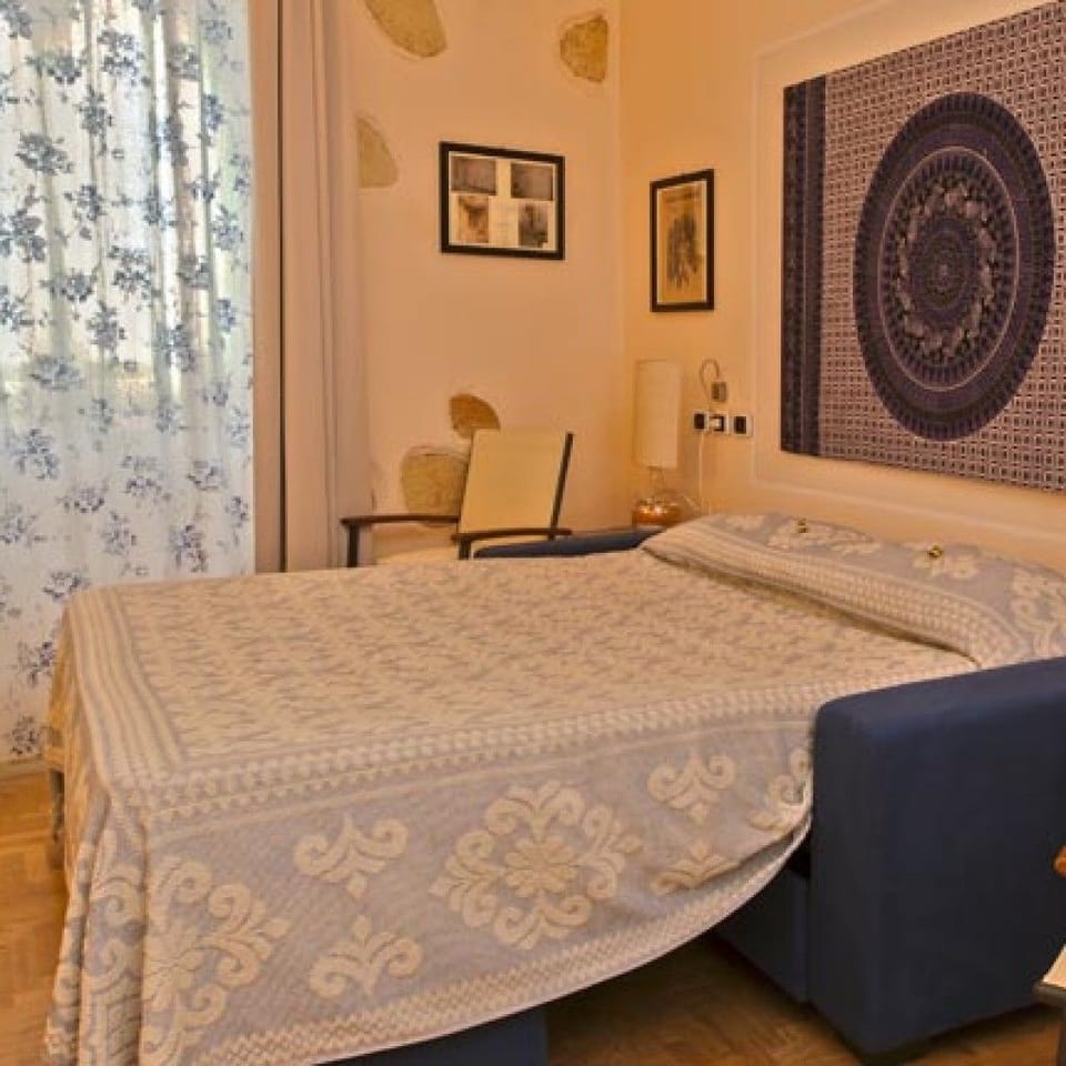 Classic Room, City View | Minibar, blackout drapes, soundproofing, iron/ironing board