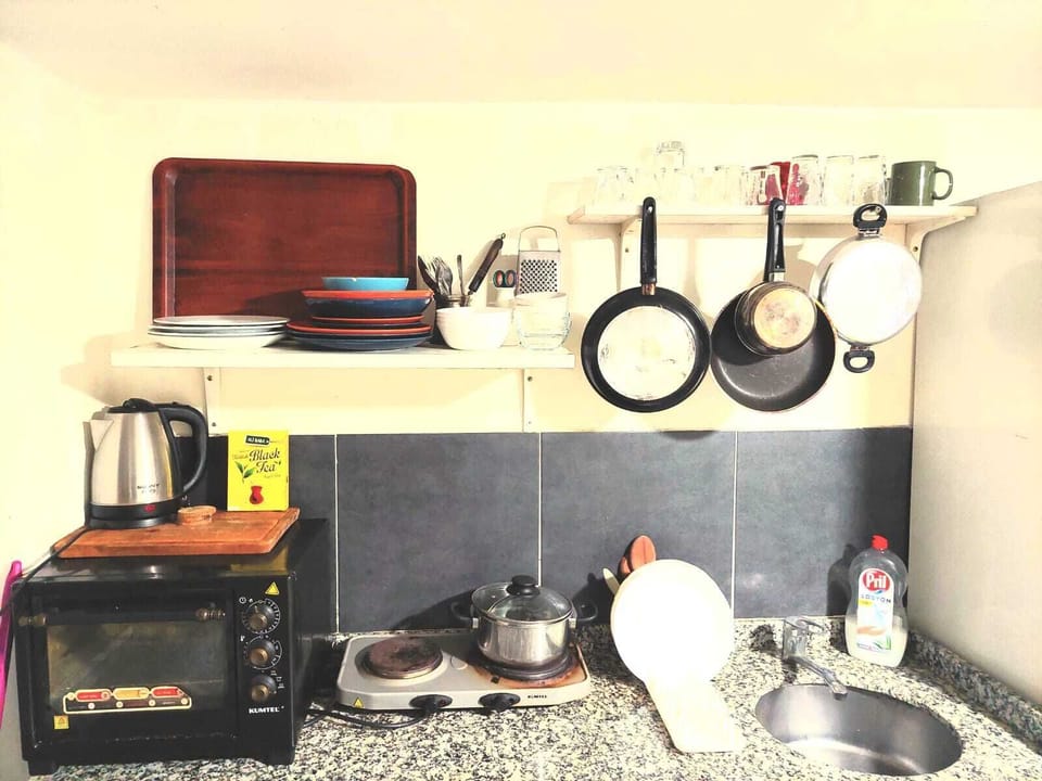 Shared Dormitory | Private kitchen | Fridge, electric kettle, cookware/dishes/utensils, cleaning supplies