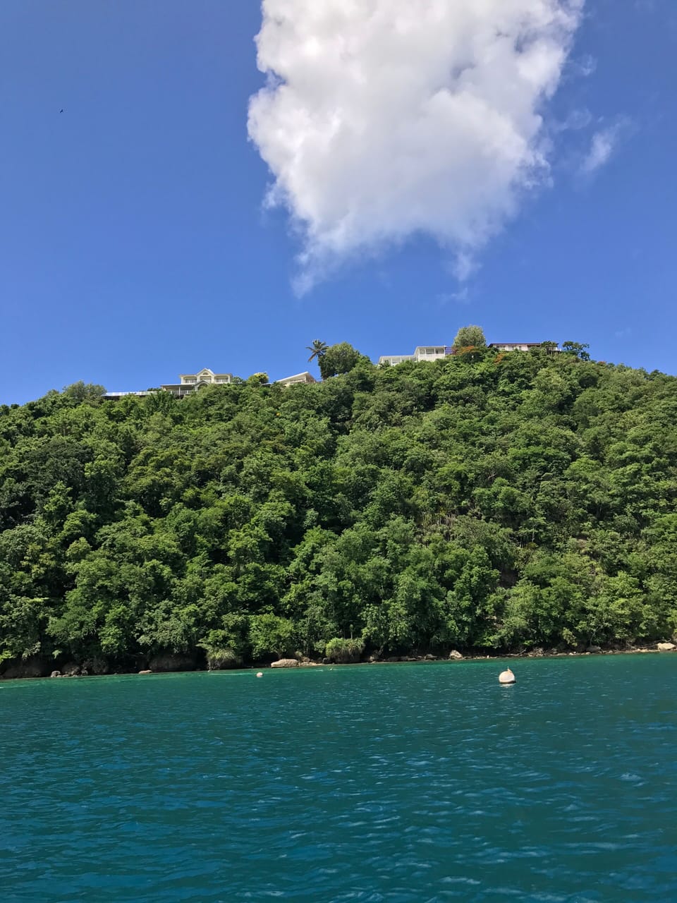 Perched on the exclusive Marigot Bay Ridge