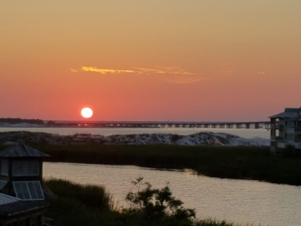The sunsets:  Winter to the left of balcony, summer every evening off Balcony.  