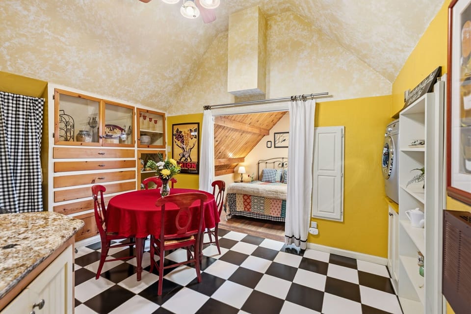 Dining looking towards bedroom with privacy curtain