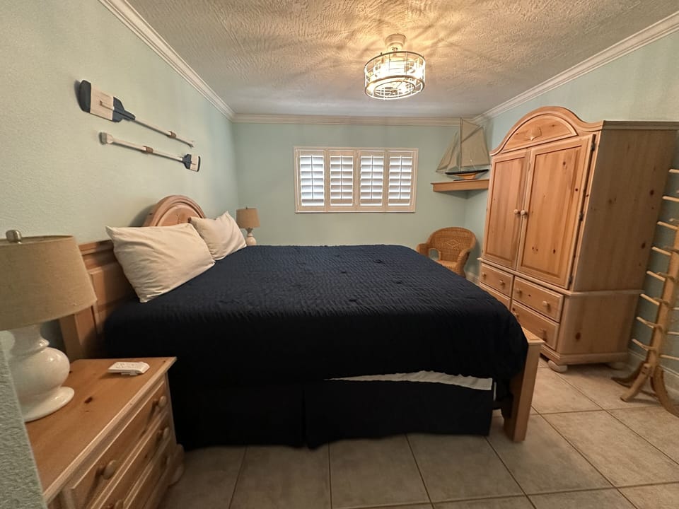 Upstairs Master bedroom with king bed and private bathroom.