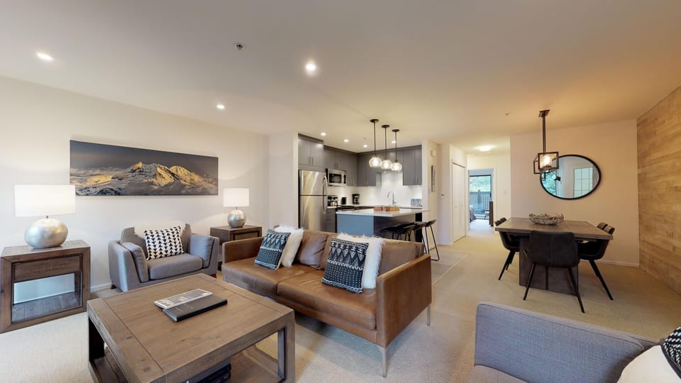 Open plan living, dining, and kitchen