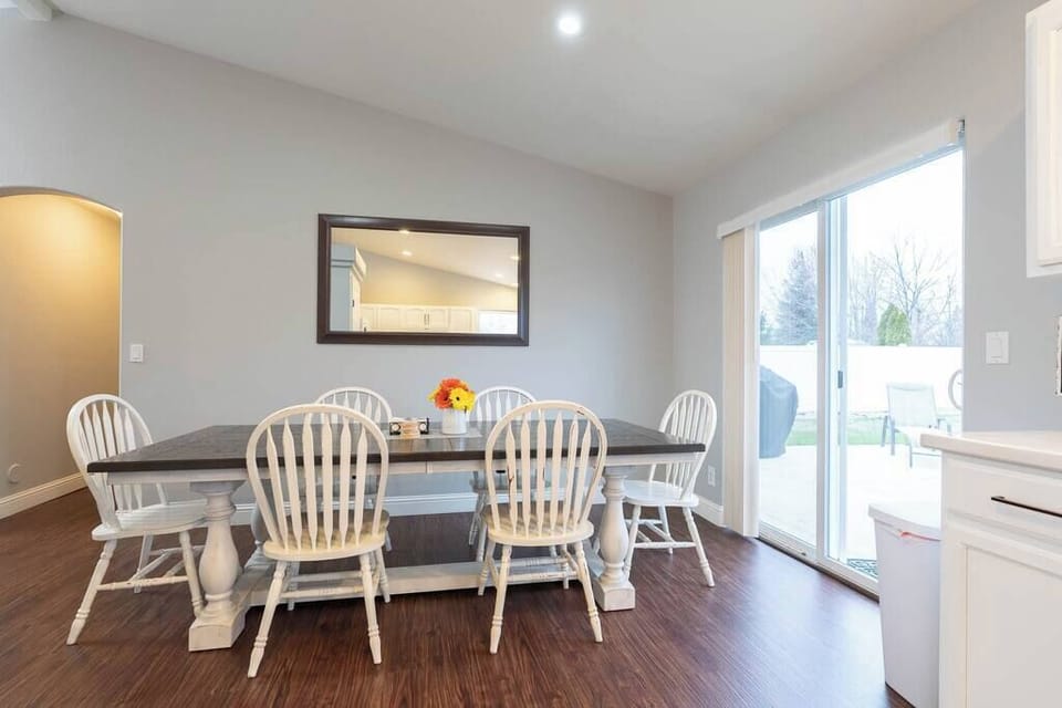 The dining room is large enough for everyone to gather there.