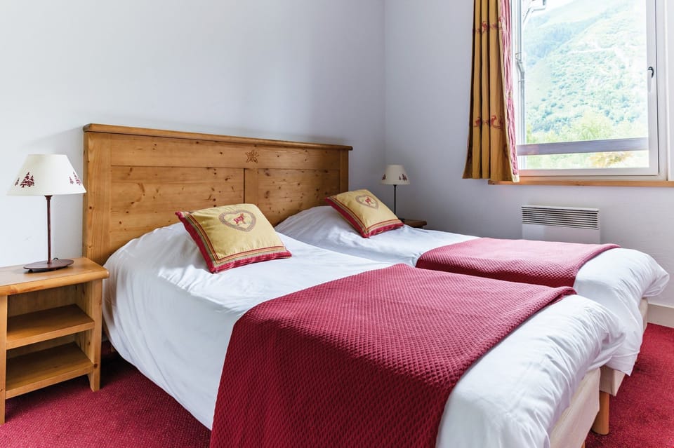 The second bedroom may contain 2 Single beds or a Bunk bed.