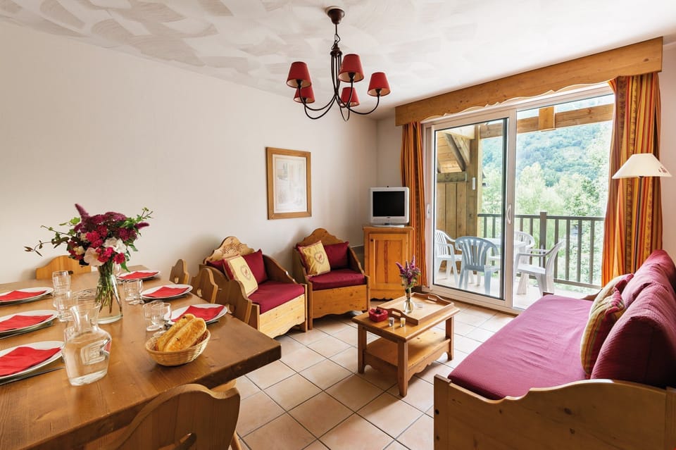 Prepare meals in the kitchenette and enjoy them at the dining table.