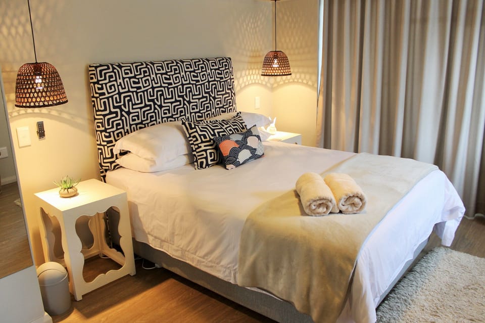 Design Apartment, 1 Bedroom, Non Smoking, Partial Sea View | 1 bedroom, in-room safe, iron/ironing board, free WiFi