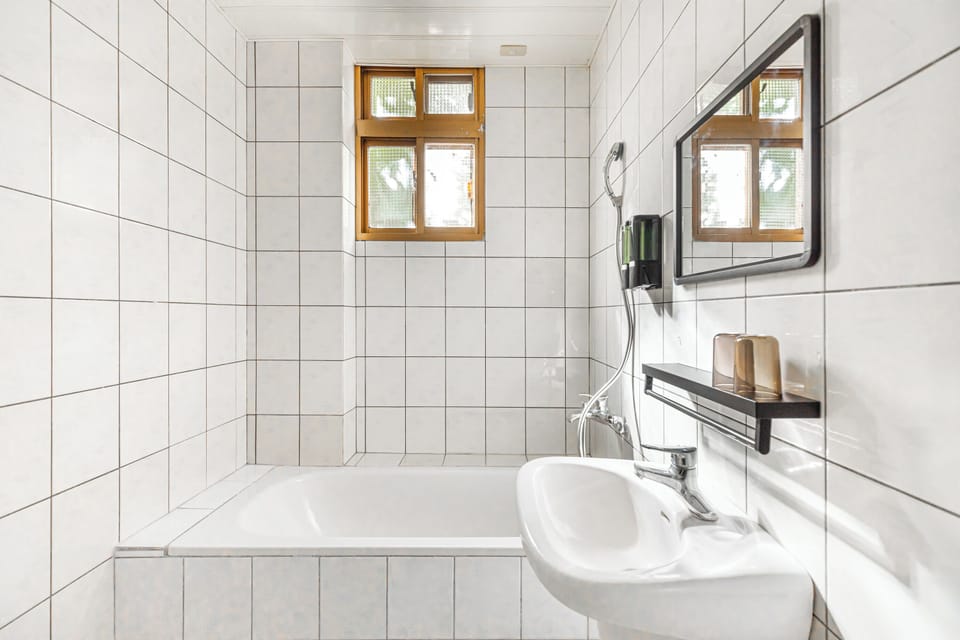 Deluxe Double Room with Bathtub | Bathroom | Hair dryer, slippers, towels, shampoo