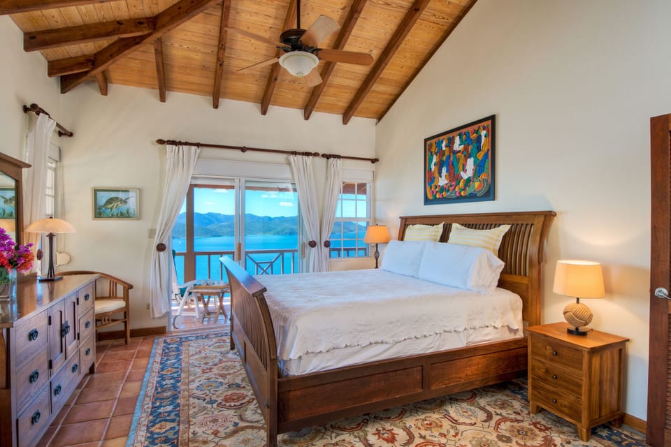 BEDROOM 2: Upstairs King suite with walk-in closet, ensuite & ocean views 