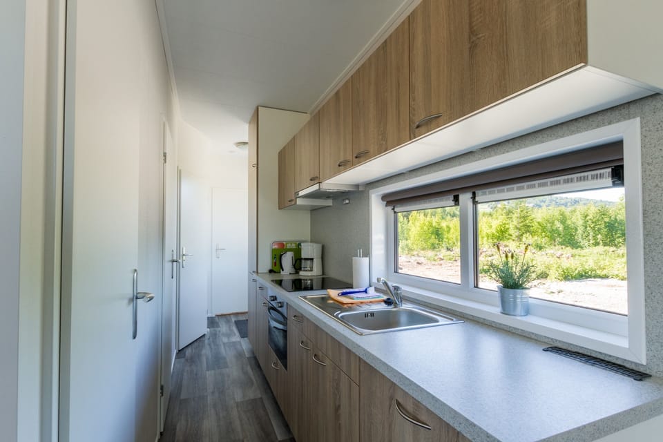 Comfort Mobile Home, 3 Bedrooms | Private kitchen | Fridge, stovetop, coffee/tea maker, electric kettle