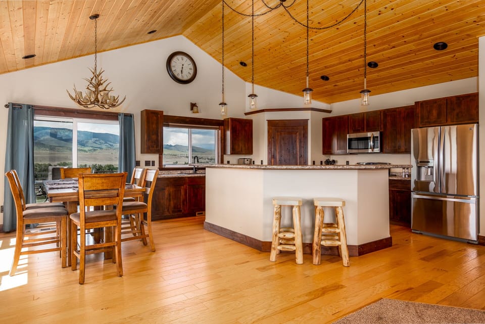 Open concept living, dining and kitchen upon entering the home!