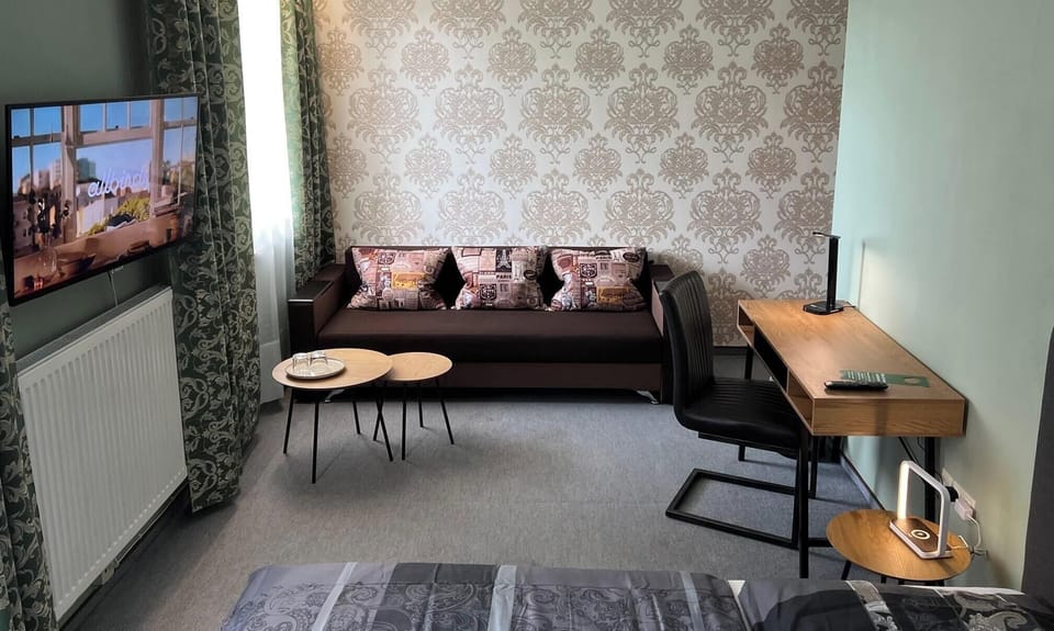 Family Double Room, Courtyard View | Desk, laptop workspace, WiFi (free), individually decorated