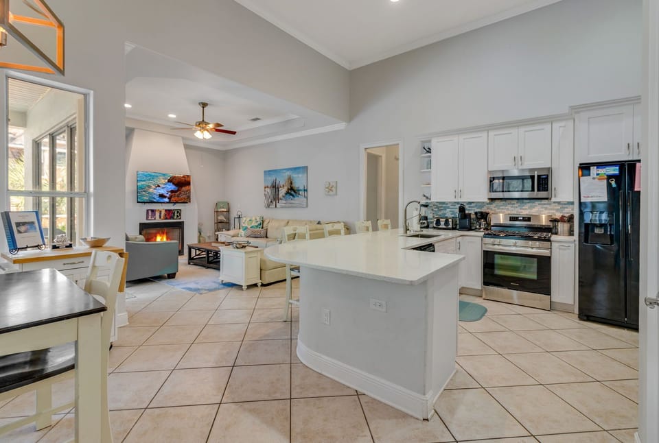 Kitchen overlooks the pool.